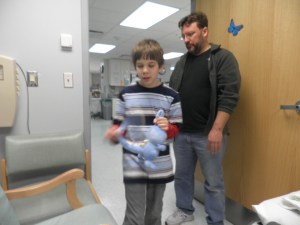 pre-op, Jonah holding his ScareMeNot, Deep Breath Dudley