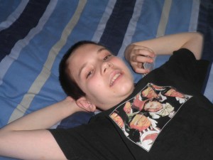 Happy boo having quiet time on the big blue bed