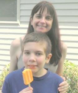 Grandma bought creamsicles and took pictures of boo & me outside